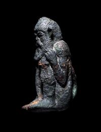 A Greek Bronze Satyr