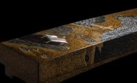 A Japanese Gold and Black Lacquer Rectangular Covered Box