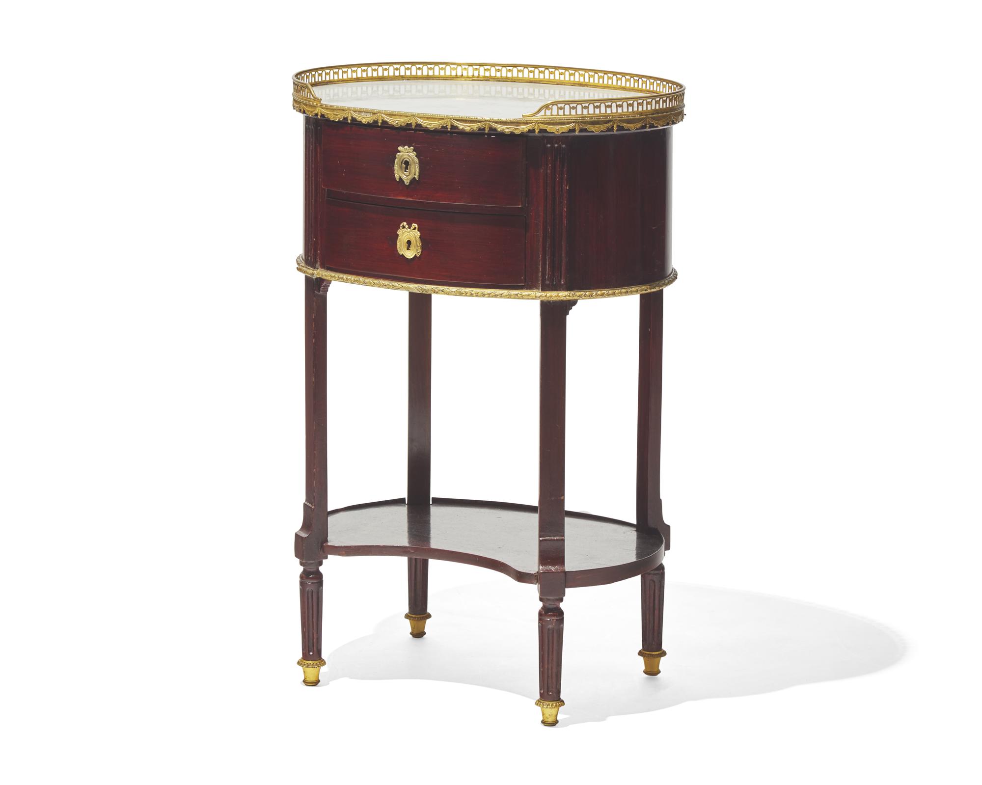 A Louis XVI gilt-bronze mounted fruitwood table en chiffonière with white marble top, circa 1790