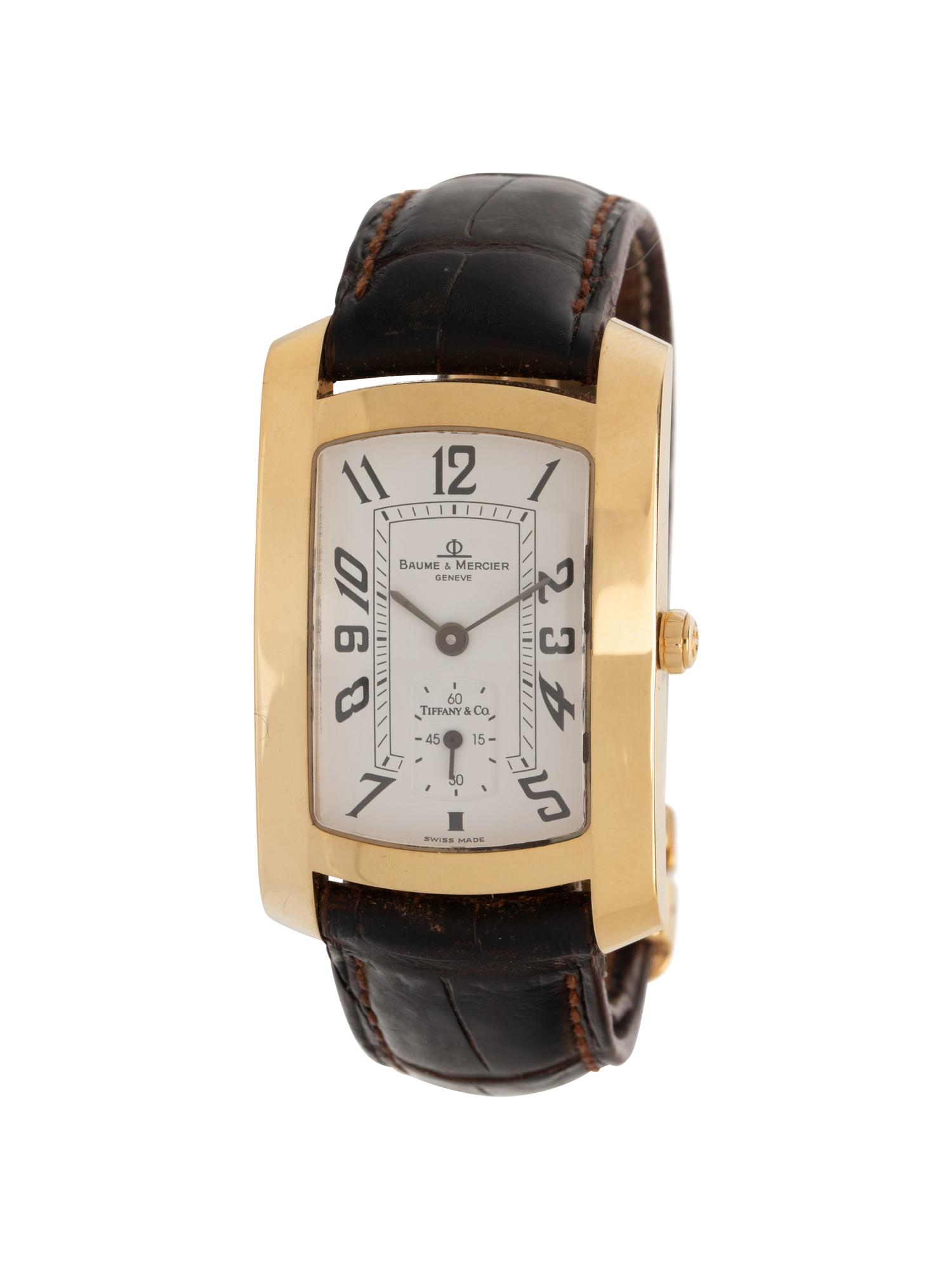 BAUME & MERCIER, RETAILED BY TIFFANY & CO., YELLOW GOLD 'HAMPTON' WATCH