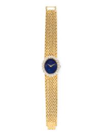 PIAGET, 18K YELLOW GOLD, DIAMOND, AND LAPIS LAZULI WATCH