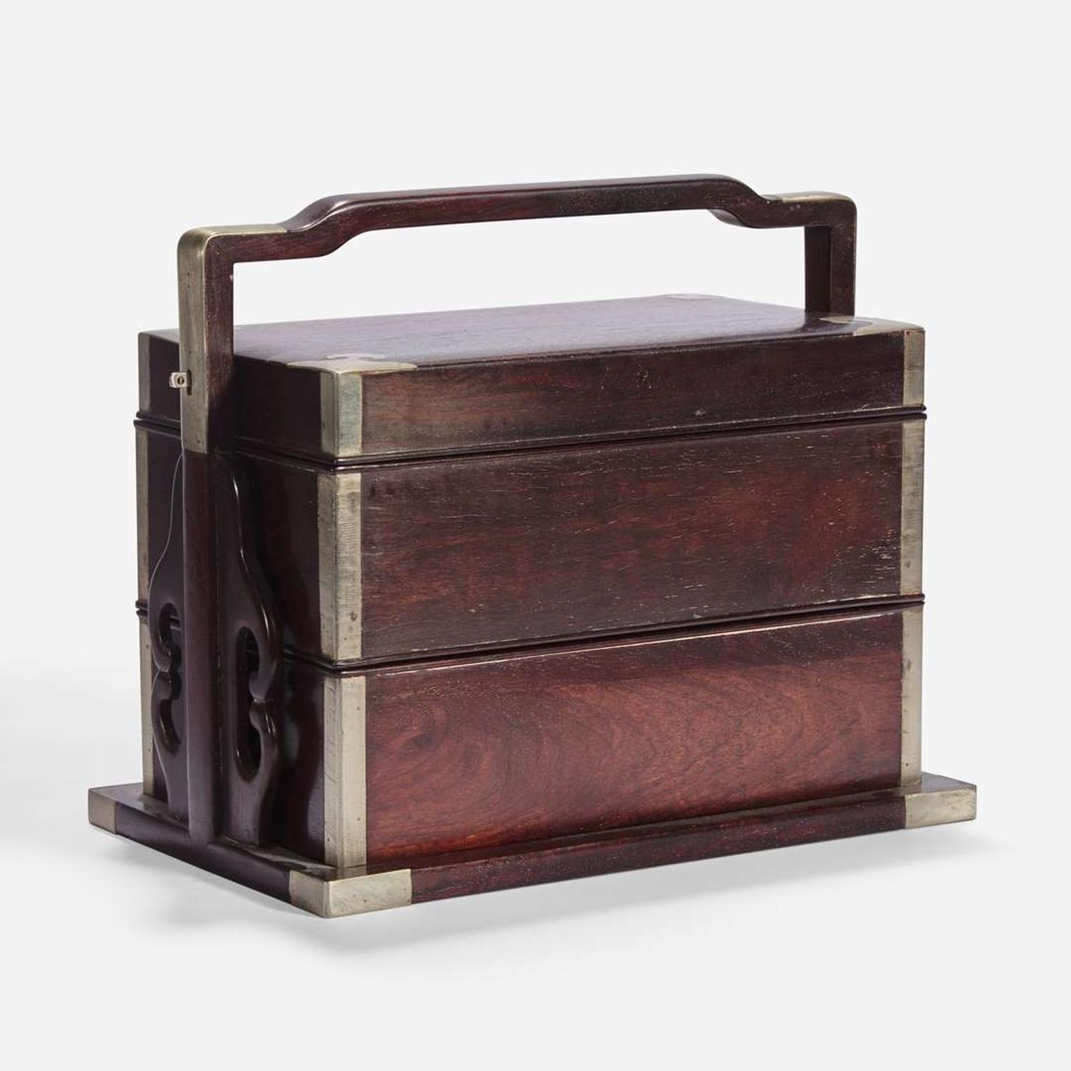 A Chinese stacking hardwood two-tier box, possibly zitan 双层提梁木盒 或紫檀