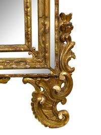 An Italian Baroque Style Giltwood Mirror