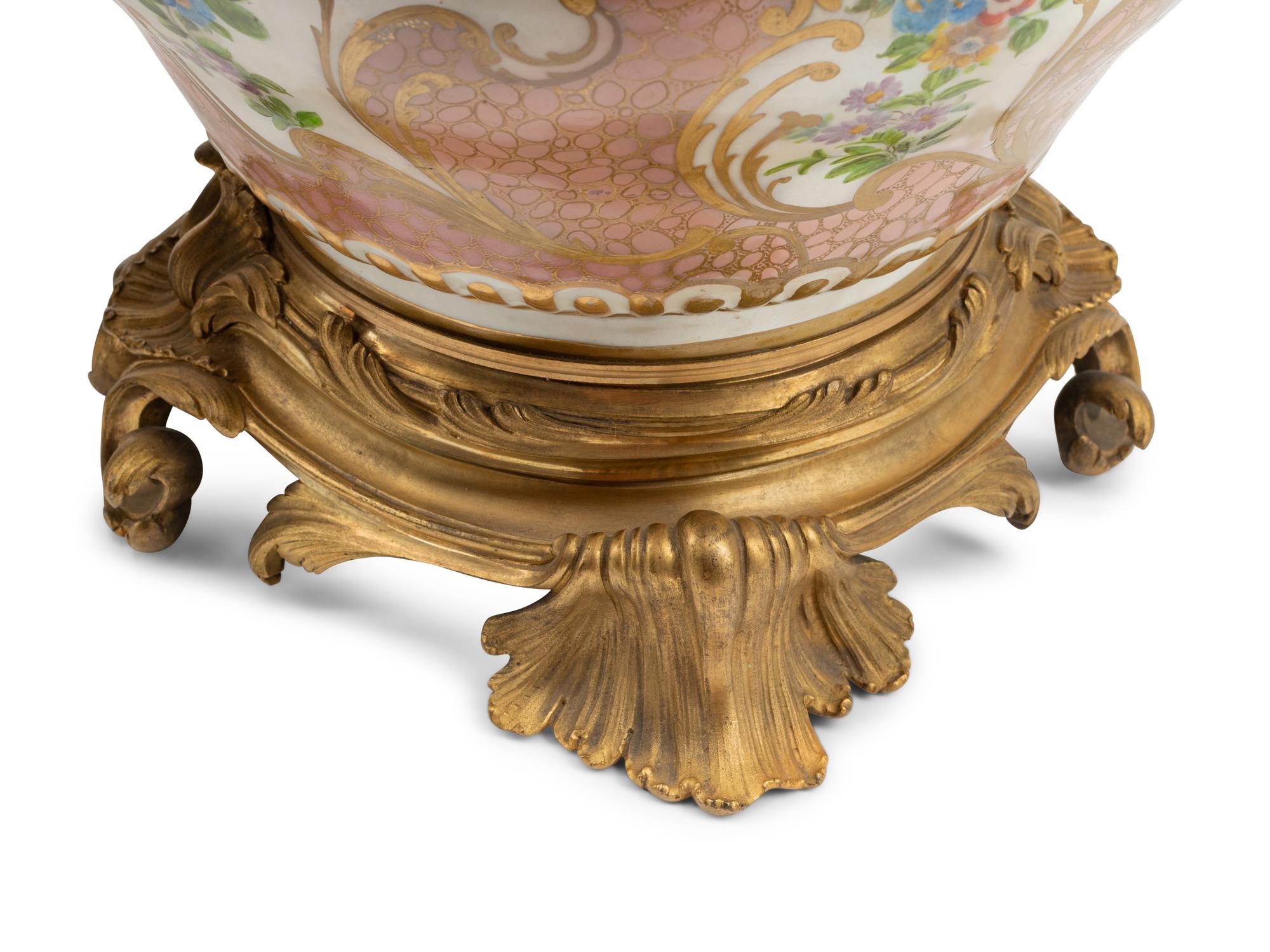 A Pair of French Gilt Bronze Mounted Sèvres Porcelain Potpourri Jars and Covers