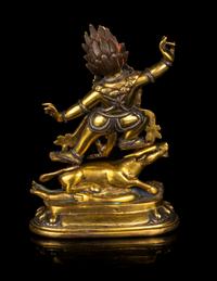 A Tibetan Gilt Bronze and Silver Inlaid Figure of Yama Dharmaraja