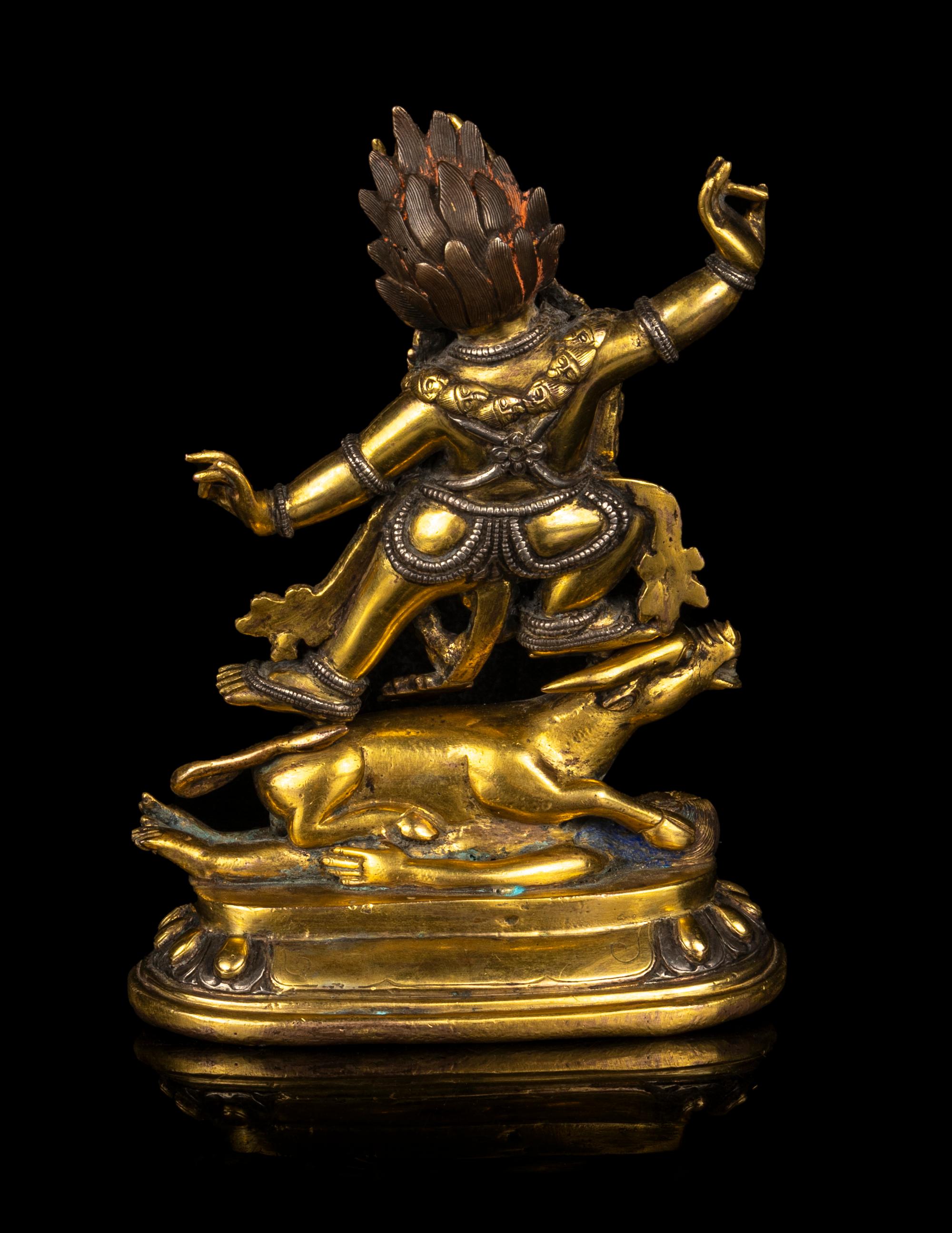 A Tibetan Gilt Bronze and Silver Inlaid Figure of Yama Dharmaraja