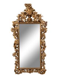 A Large Italian Baroque Style Carved Giltwood Mirror