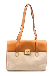 A Celine Ivory Canvas and Tan Leather Bag, 13 1/2 x 9 x 4 inches.