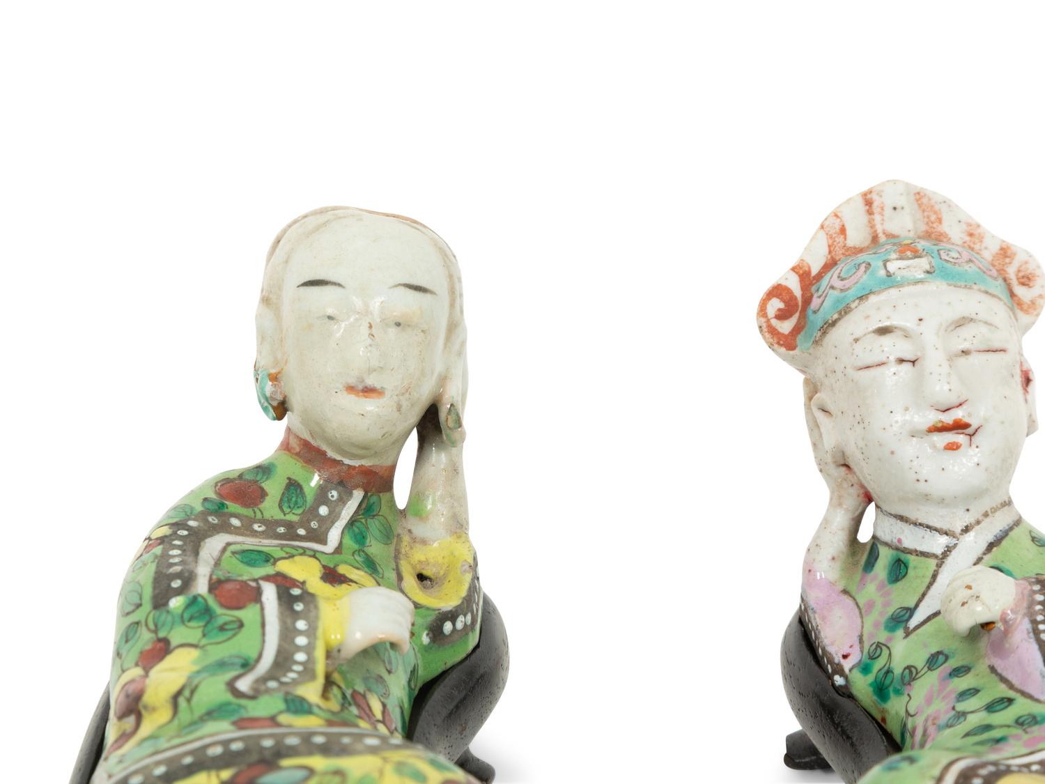 A Pair of Chinese Porcelain Reclining Figures