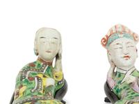 A Pair of Chinese Porcelain Reclining Figures