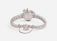 A Ladies Hidden Dial Platinum and Diamond Omega Watch