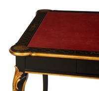 A Regency Style Black Lacquer and Parcel Gilt Card Table with Red Inset Leather Top