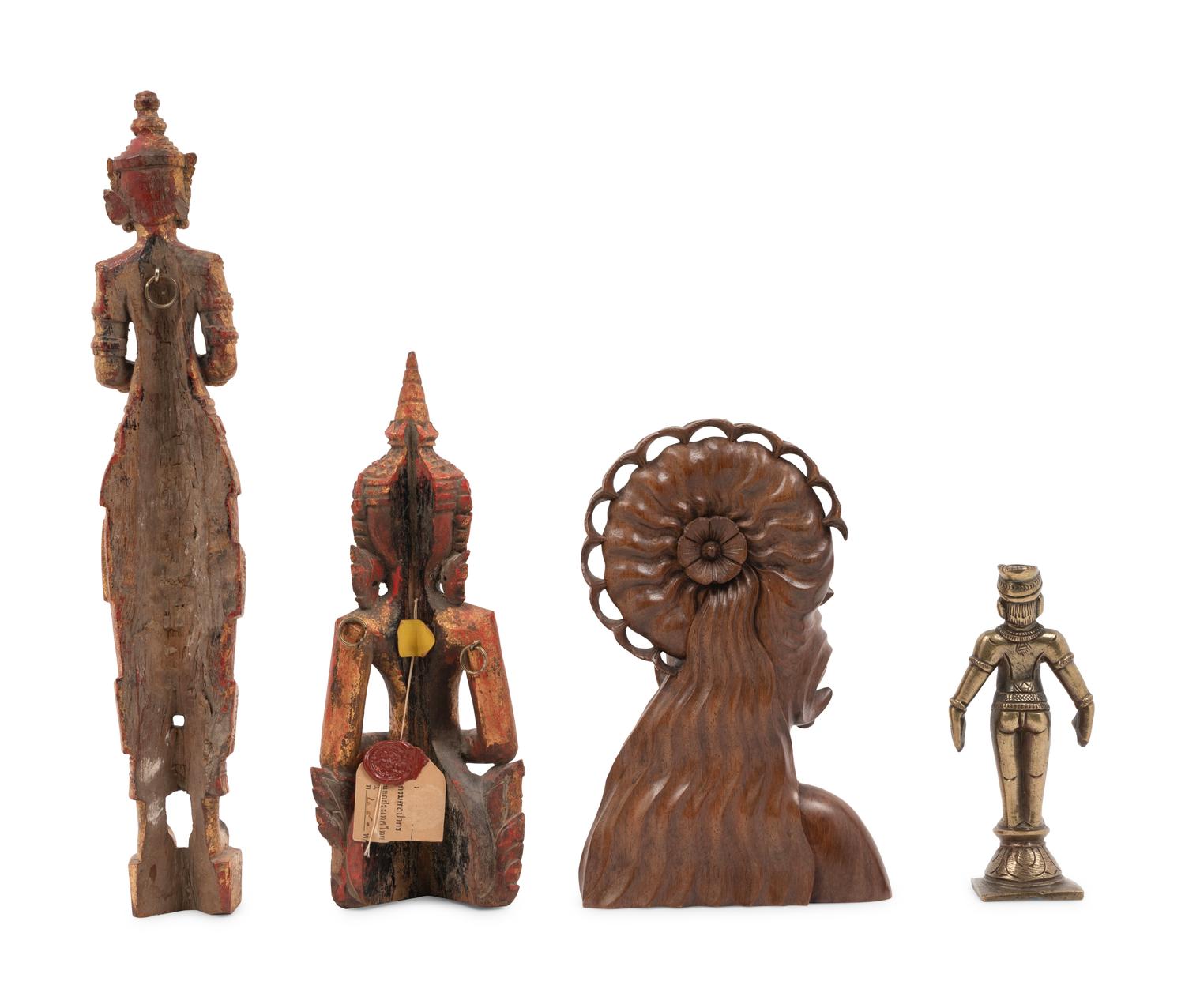 An Indonesian Carved Wood Bust, Two Thai Giltwood Figures and an Indian Brass Figure