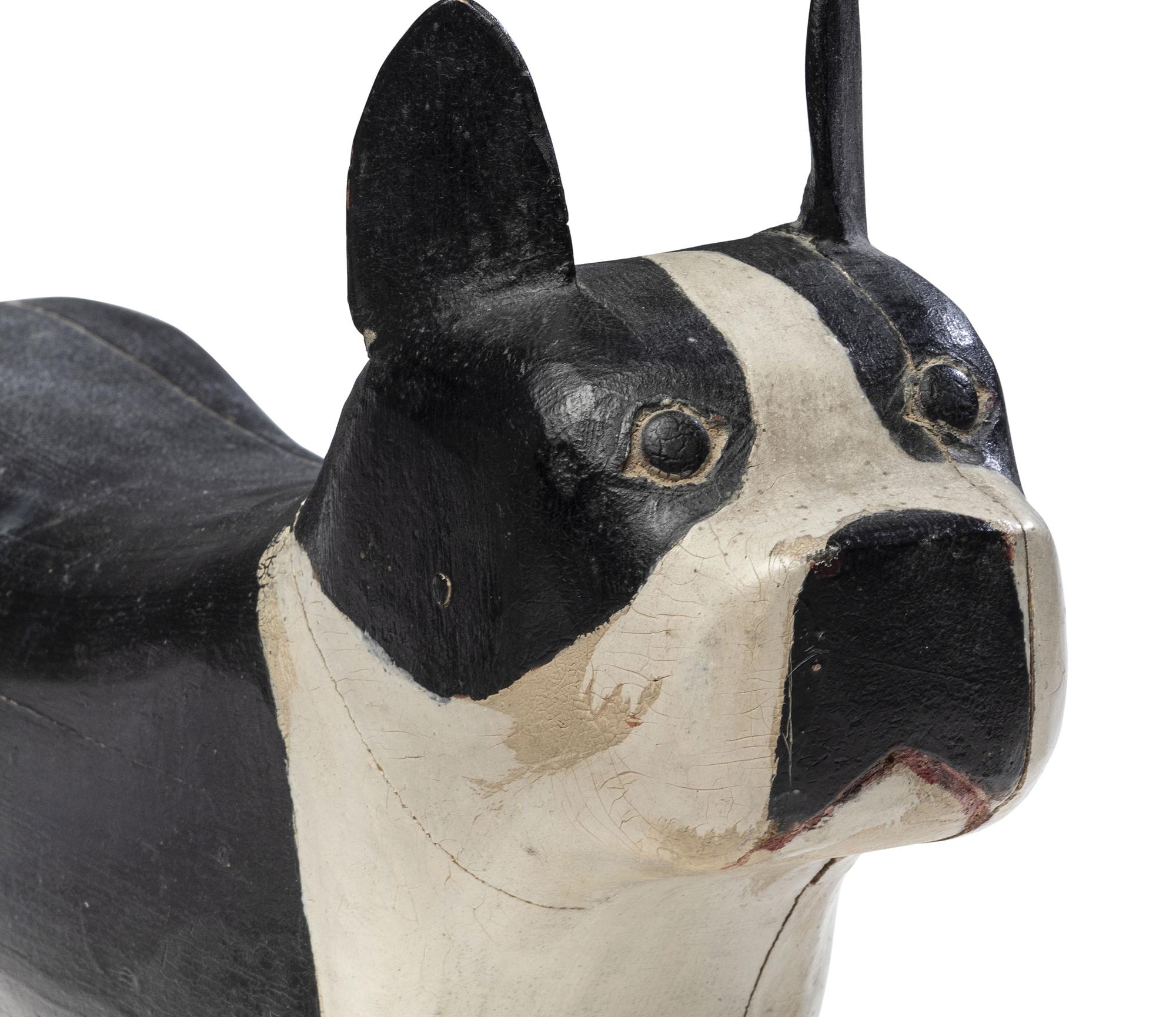 A Set of Four Carved and Painted Wood Boston Terrier Figures