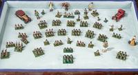 A Collection of Miniature Lead Soldiers in a Louis XV Style Vitrine Table