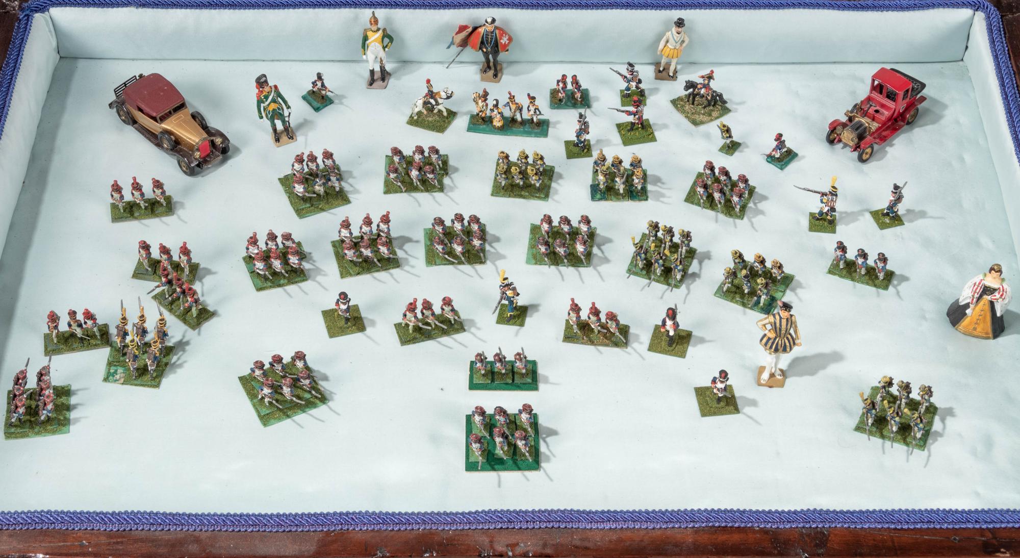 A Collection of Miniature Lead Soldiers in a Louis XV Style Vitrine Table