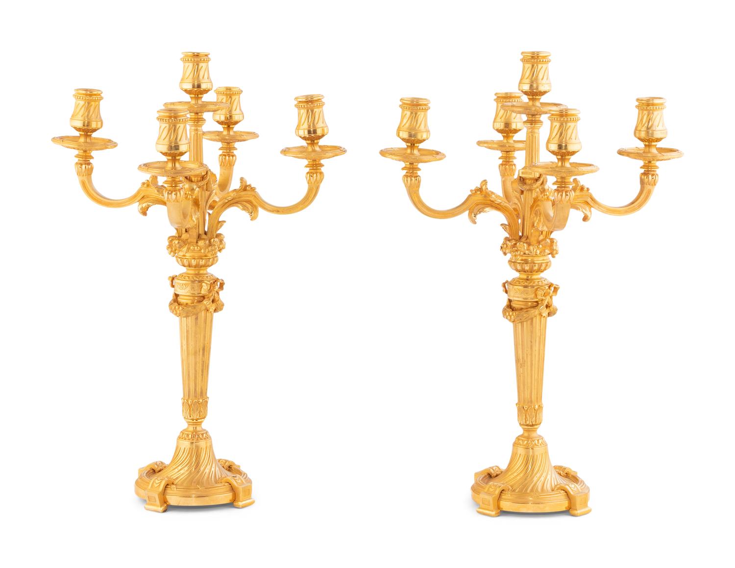 A Pair of Louis XVI Style Gilt Bronze Five-Light Candelabra