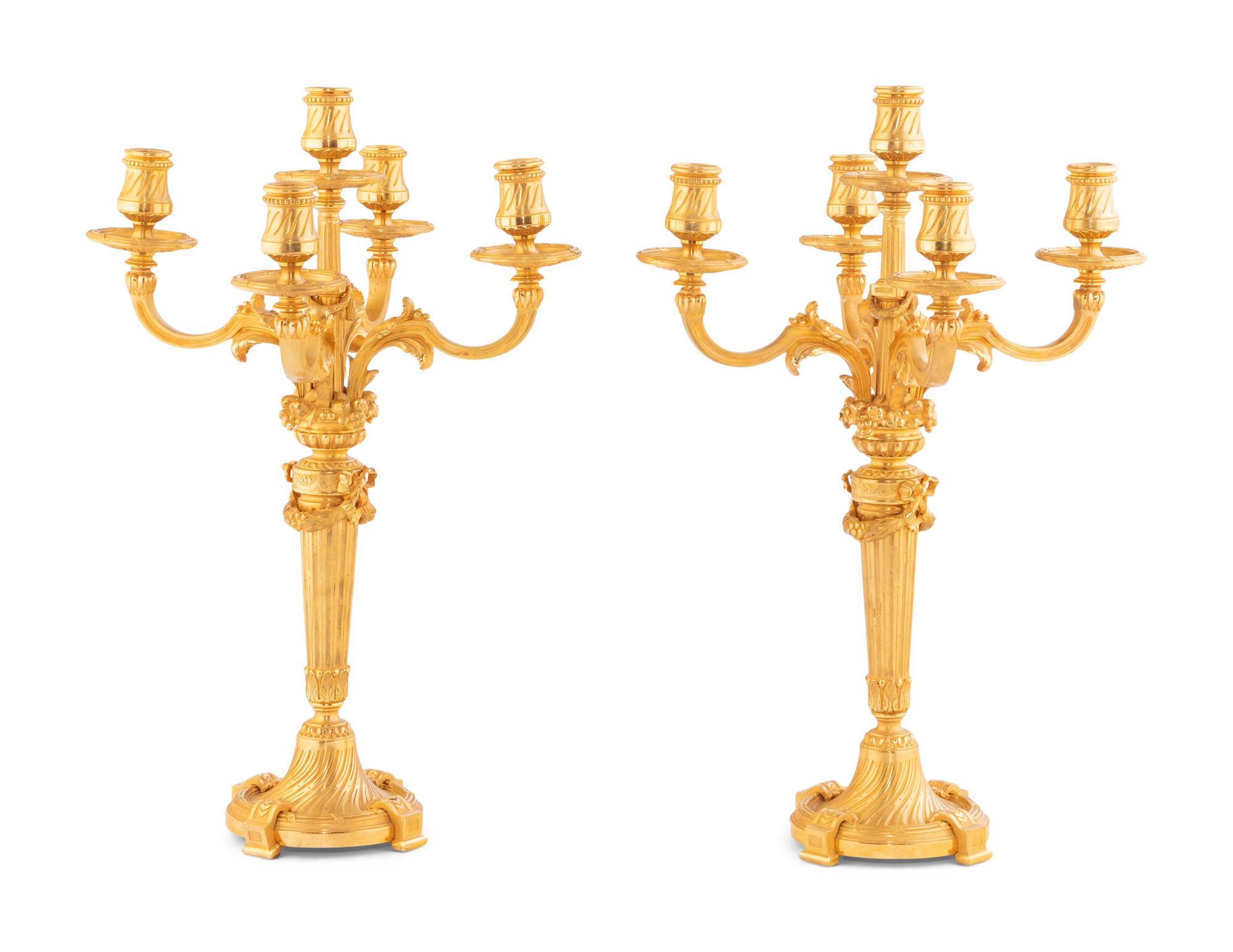 A Pair of Louis XVI Style Gilt Bronze Five-Light Candelabra