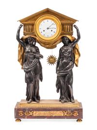 A Large French Gilt and Patinated Bronze and Rouge Marble Three-Piece Clock Garniture