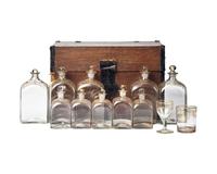 A Federal Oak Liquor Case Fitted with Gilt-Decorated Glass Bottles and Glasses