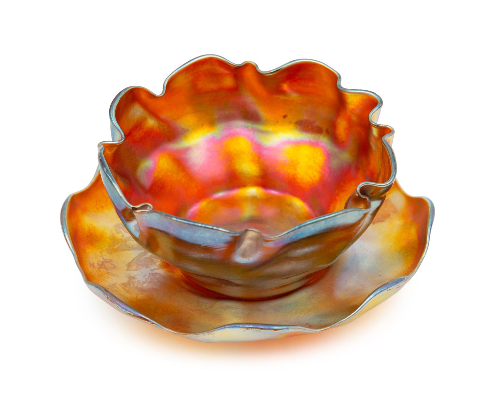 A Set of Six Tiffany Studios Favrile Glass Bowls and Saucers