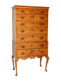 A Queen Anne Figured and Carved Maple Flat-Top High Chest