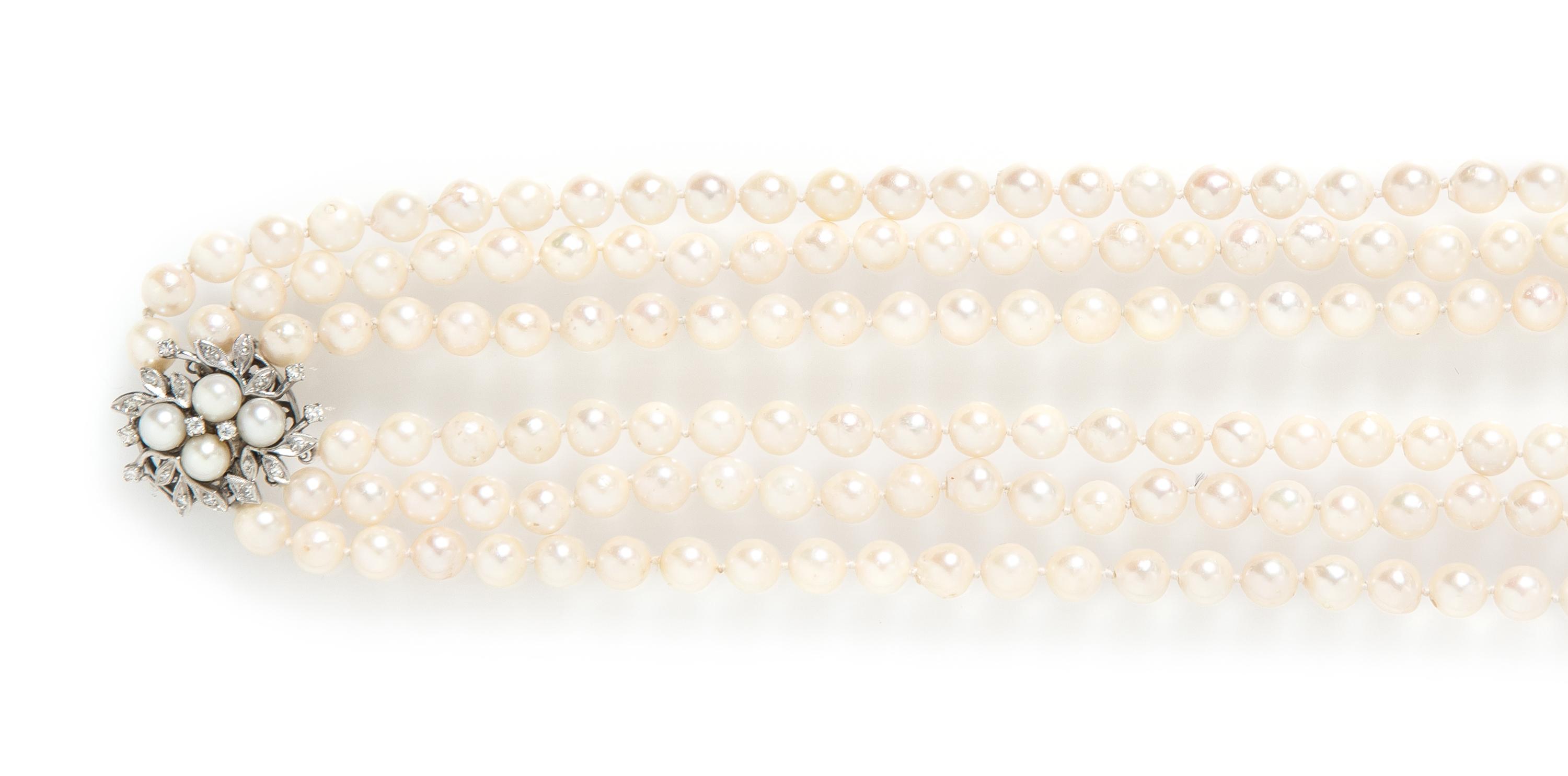 A White Gold, Diamond and Cultured Pearl Necklace, 123.90 dwts.