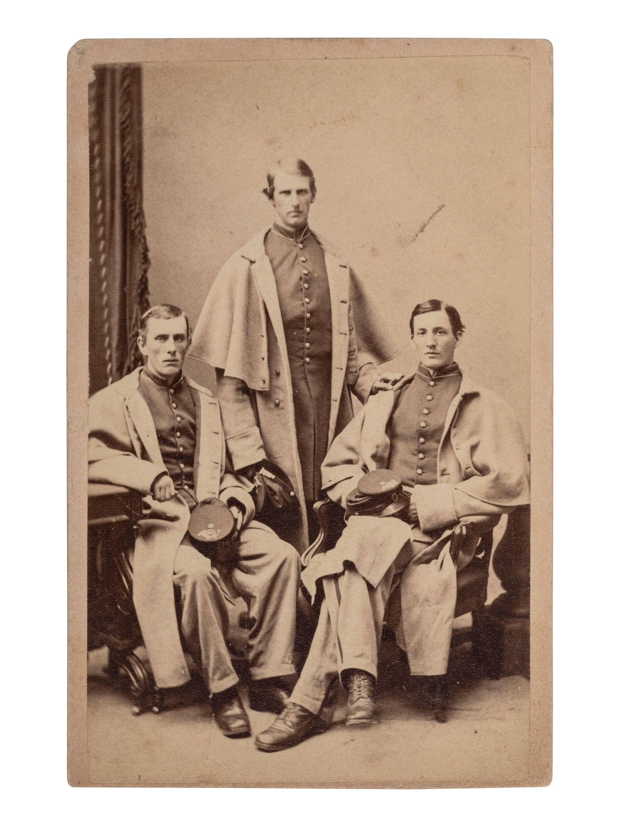 [UNITED STATES COLORED TROOPS]. CDV of three officers, identified on verso as 54th Massachusetts Infantry, USCT. Boston: J. W. Black, ca 1860s.