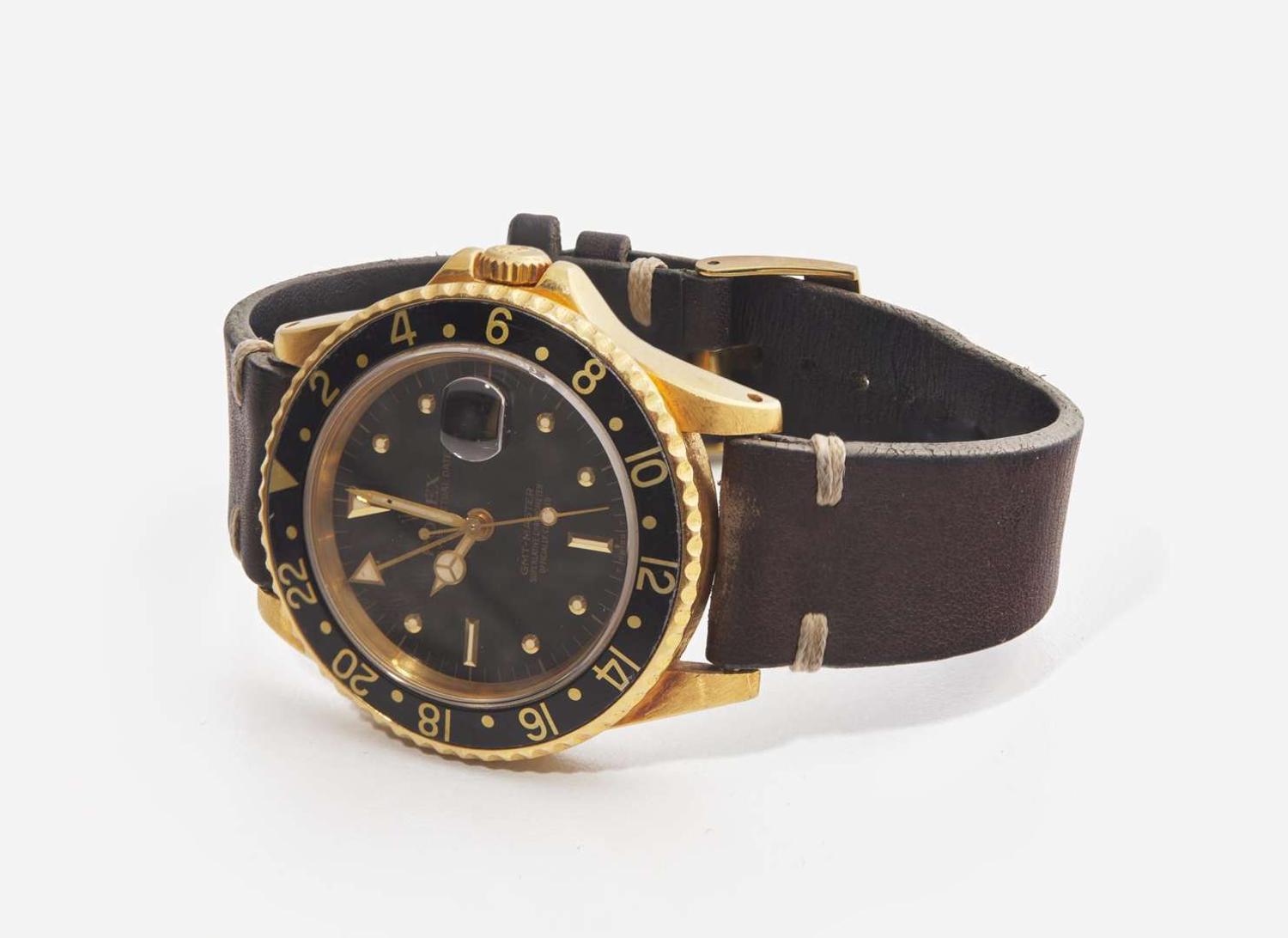 A Men's 18K Yellow Gold Rolex GMT Master