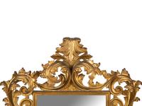 An Italian Rococo Style Giltwood Mirror