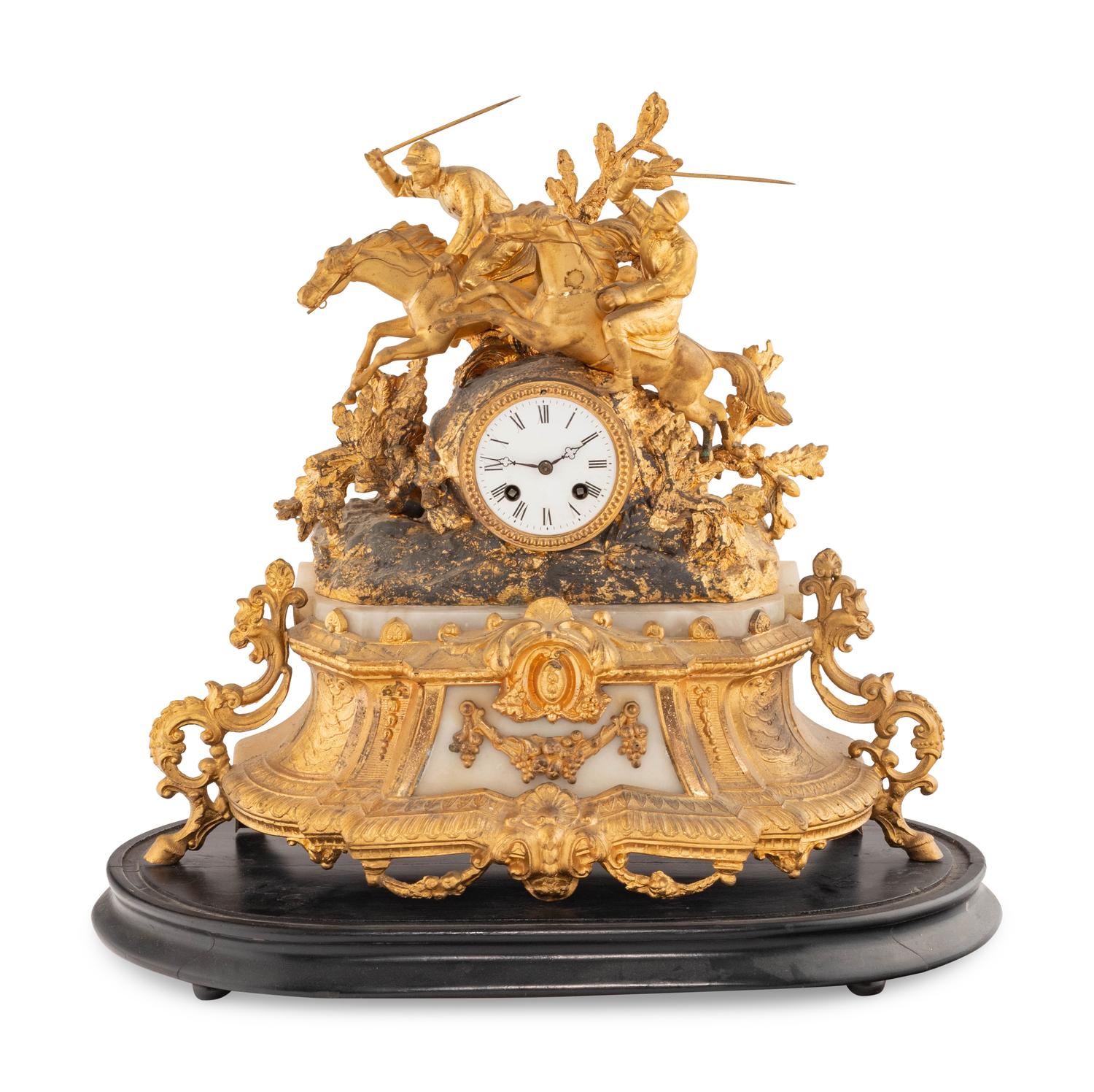 A French Gilt Metal and Alabaster Mantel Clock