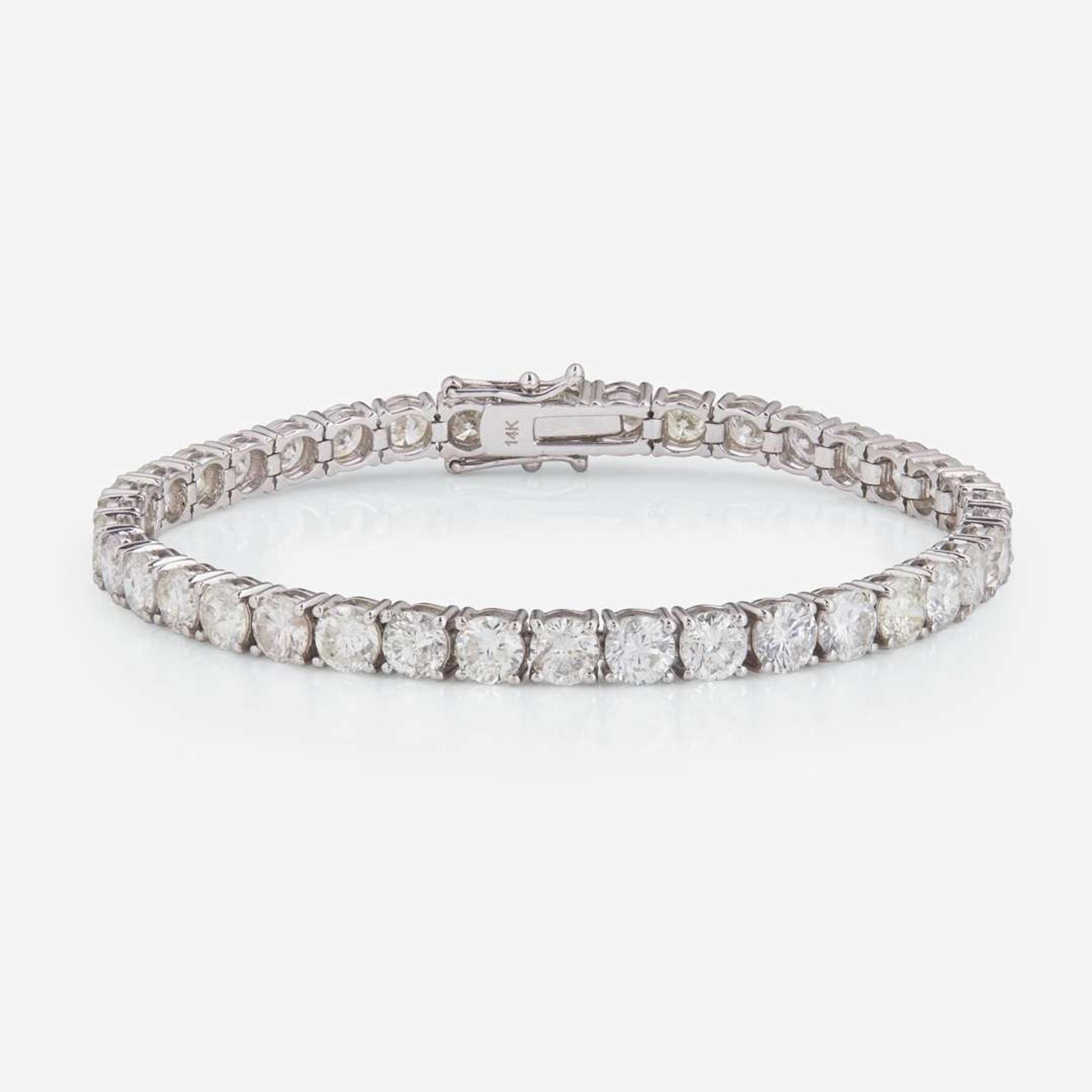 A 14K White Gold and Diamond Line Bracelet