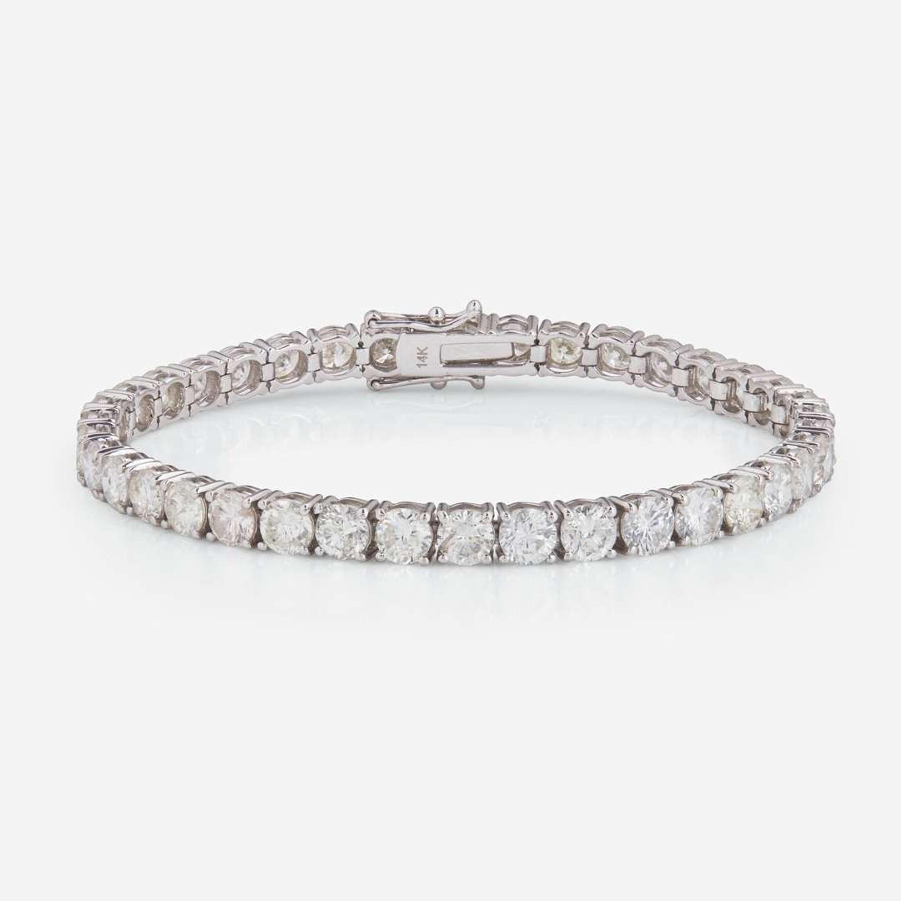 A 14K White Gold and Diamond Line Bracelet