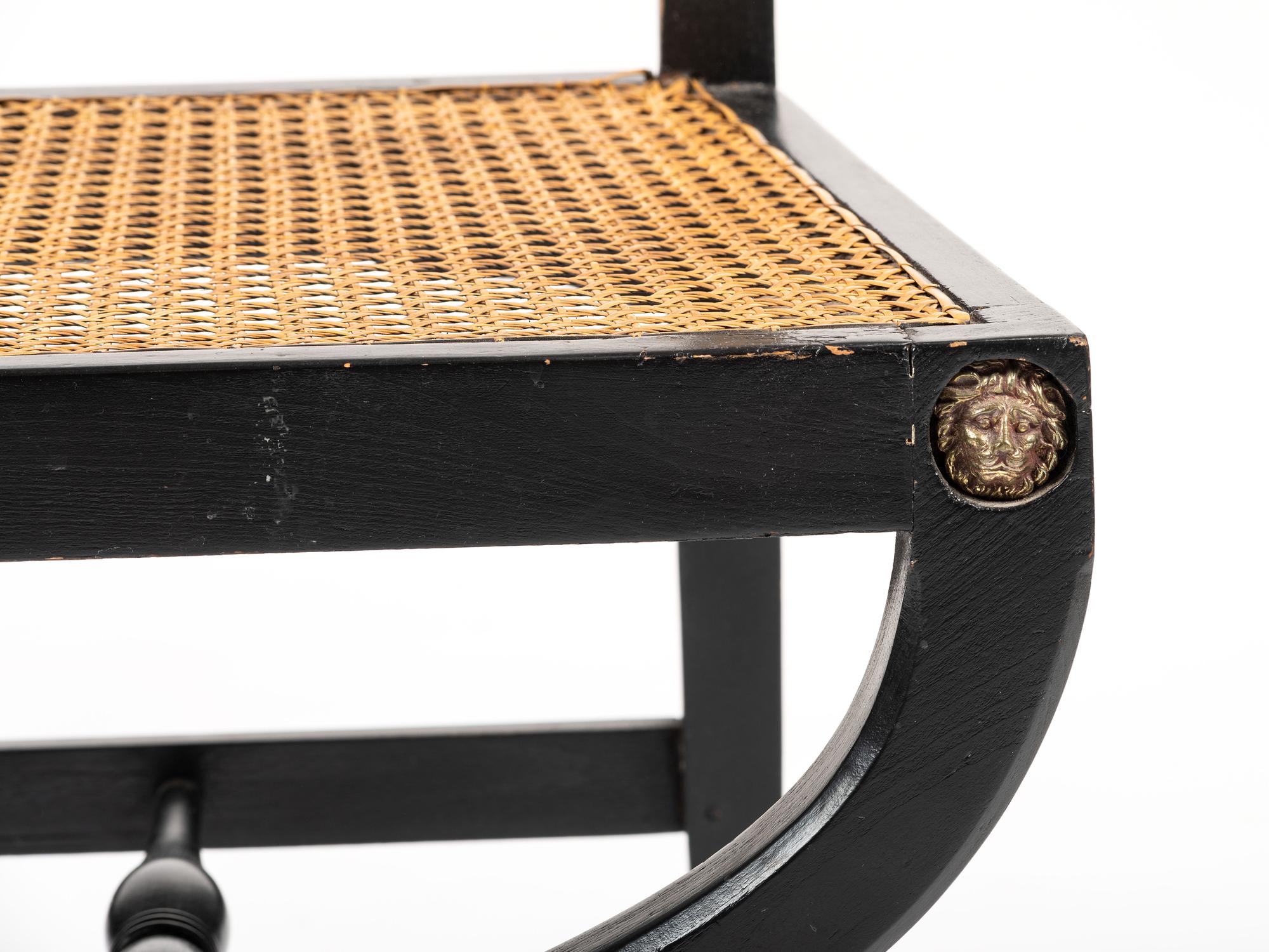A Pair of Neoclassical Style Ebonized Curule Side Chairs