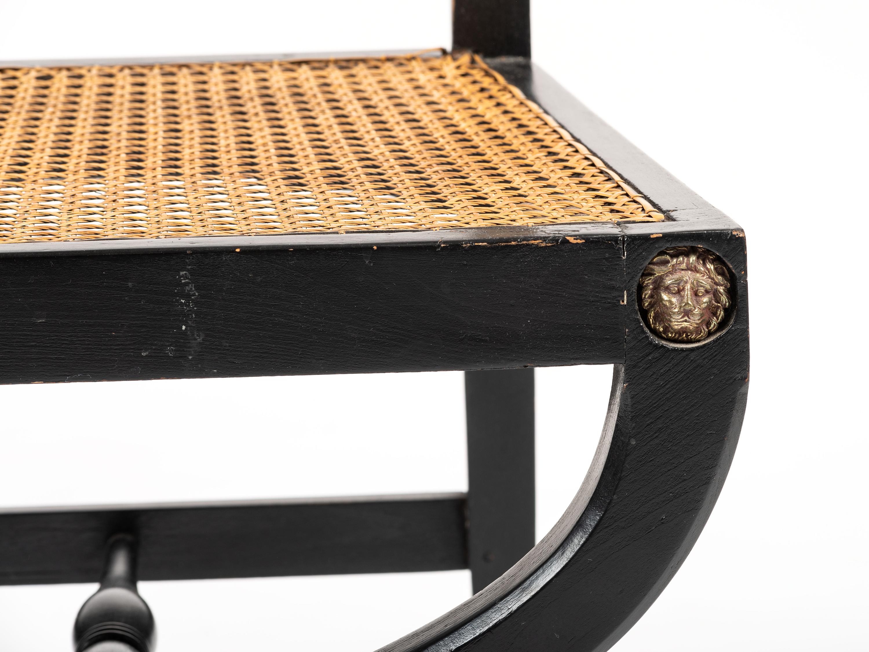 A Pair of Neoclassical Style Ebonized Curule Side Chairs