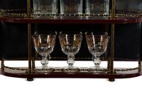 A Brass-Mounted Liquor Rack with Glasses and Tantalus