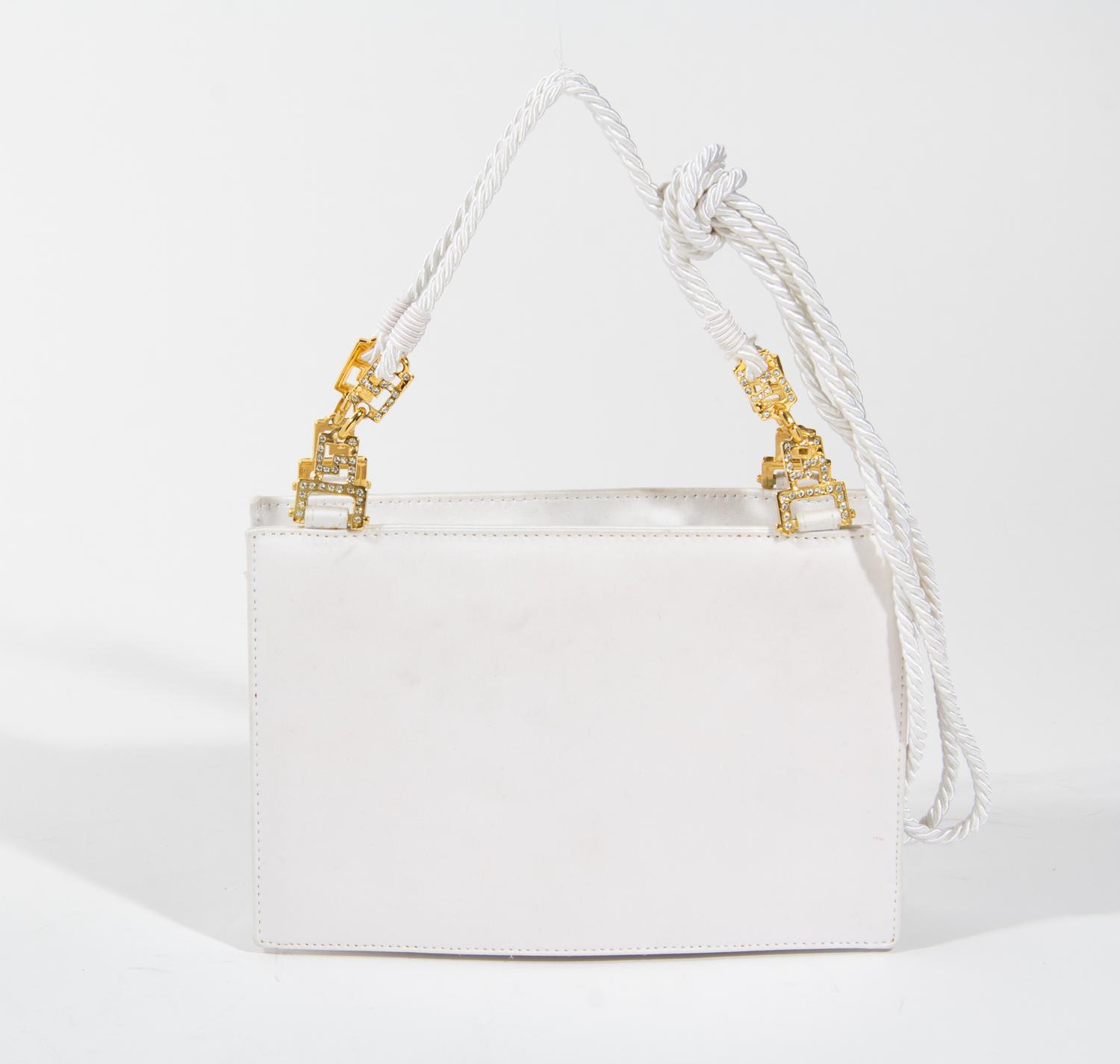 A Gianni Versace White Silk Medusa Shoulder Bag, 9" x 6" x 2".