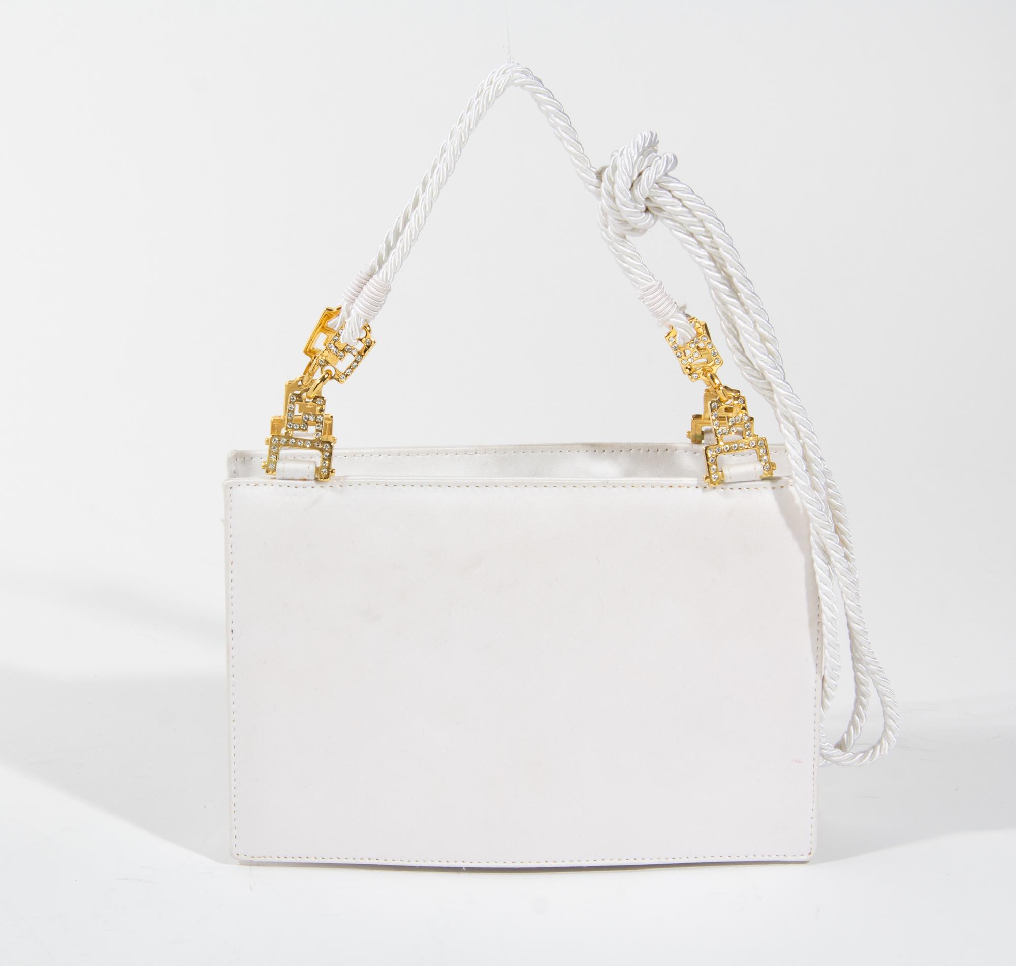 A Gianni Versace White Silk Medusa Shoulder Bag, 9" x 6" x 2".