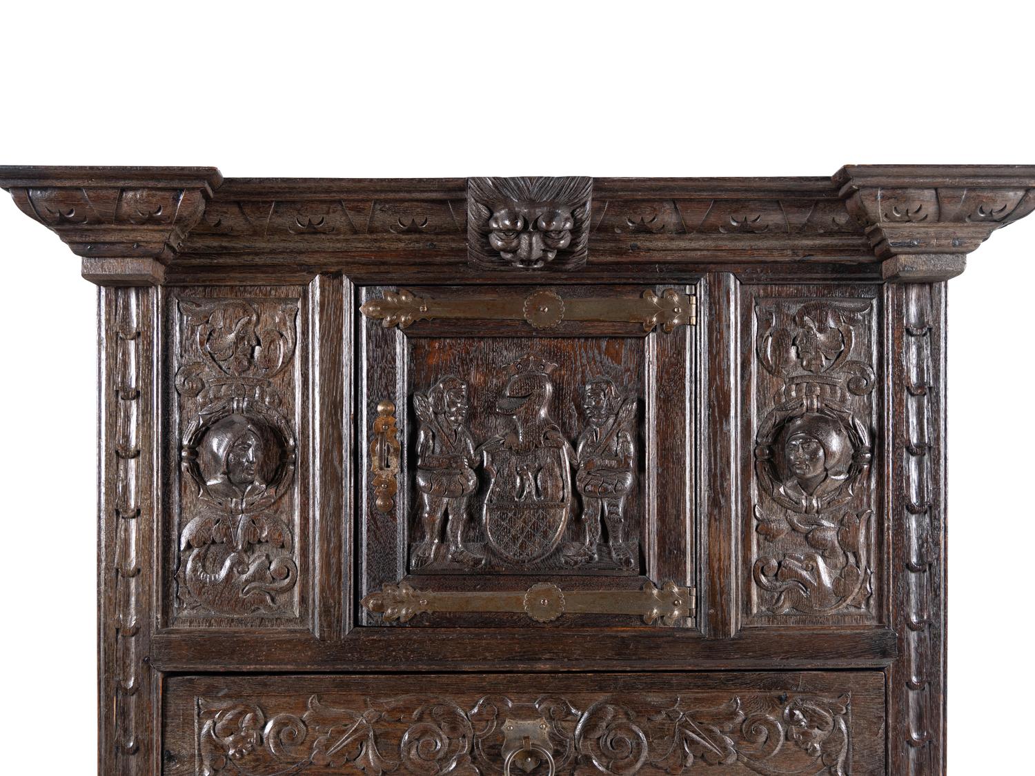 A Renaissance Style Carved Oak Cabinet