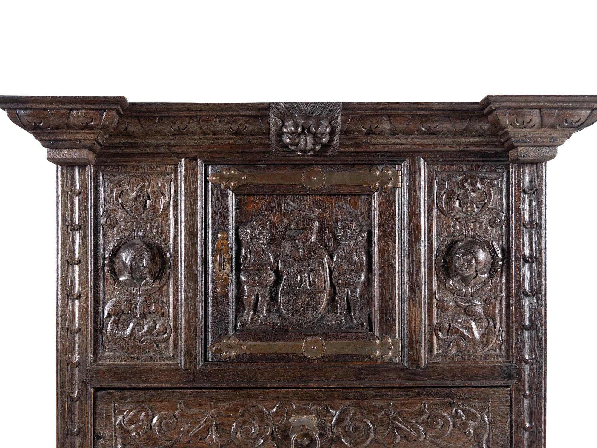 A Renaissance Style Carved Oak Cabinet