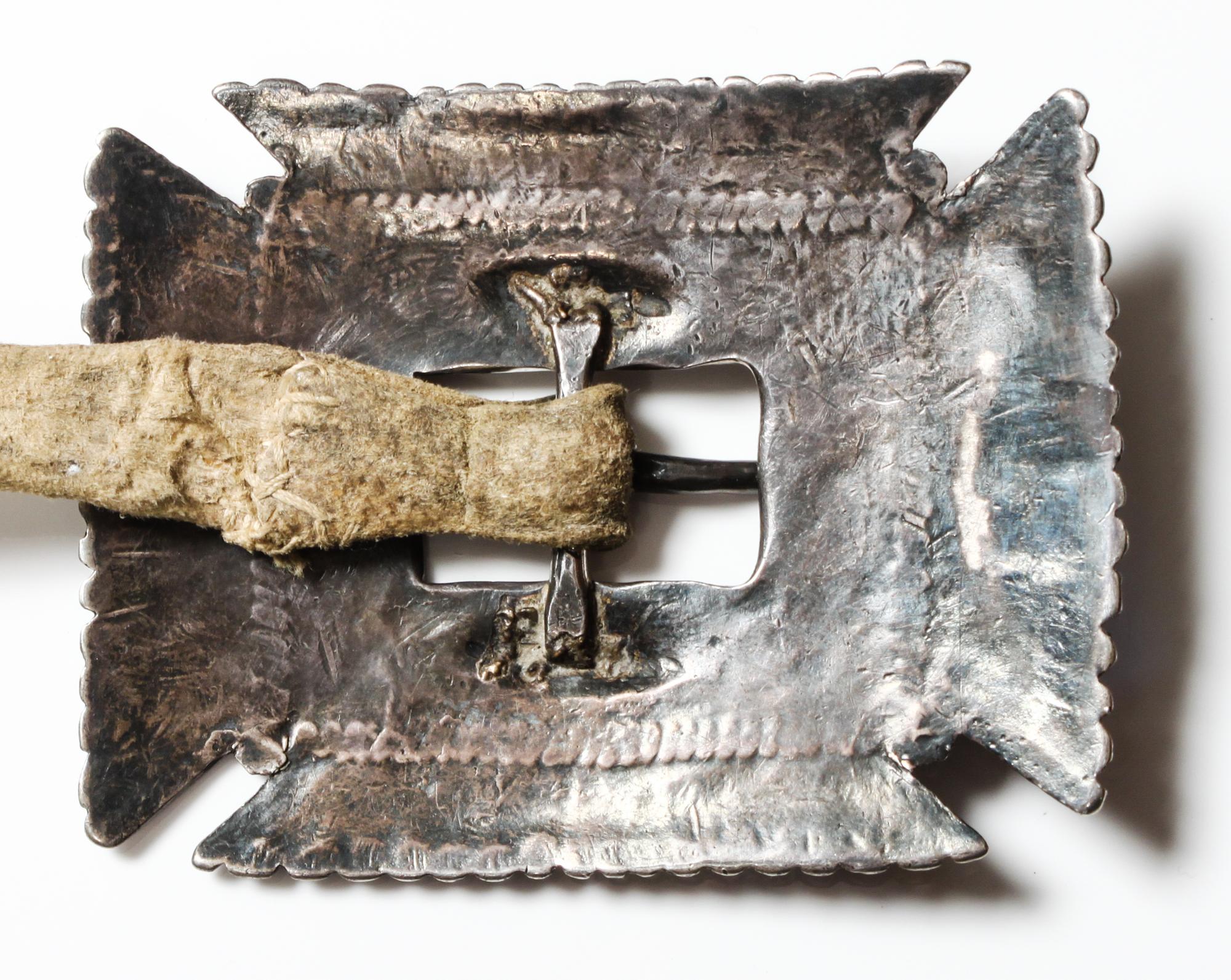 A Navajo First Phase Concho Belt Length overall 33 inches; concho 4 x 3 1/2; buckle 3 7/8 x 3 1/8 inches. — LATE 19TH/EARLY 20TH CENTURY