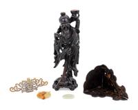 A Chinese Carved Hardwood Figure