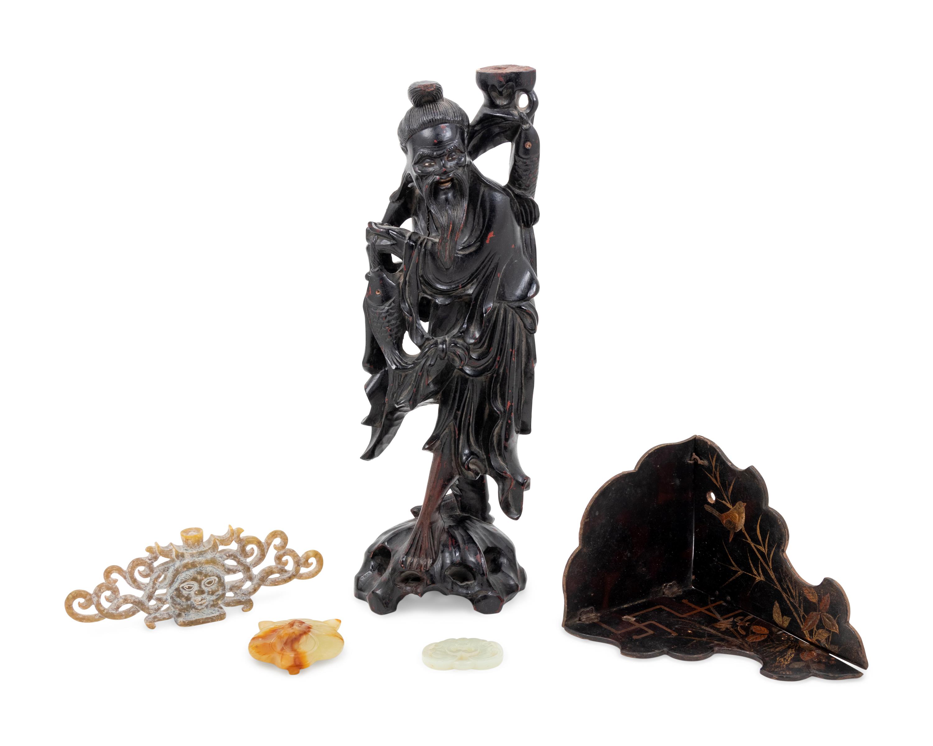 A Chinese Carved Hardwood Figure