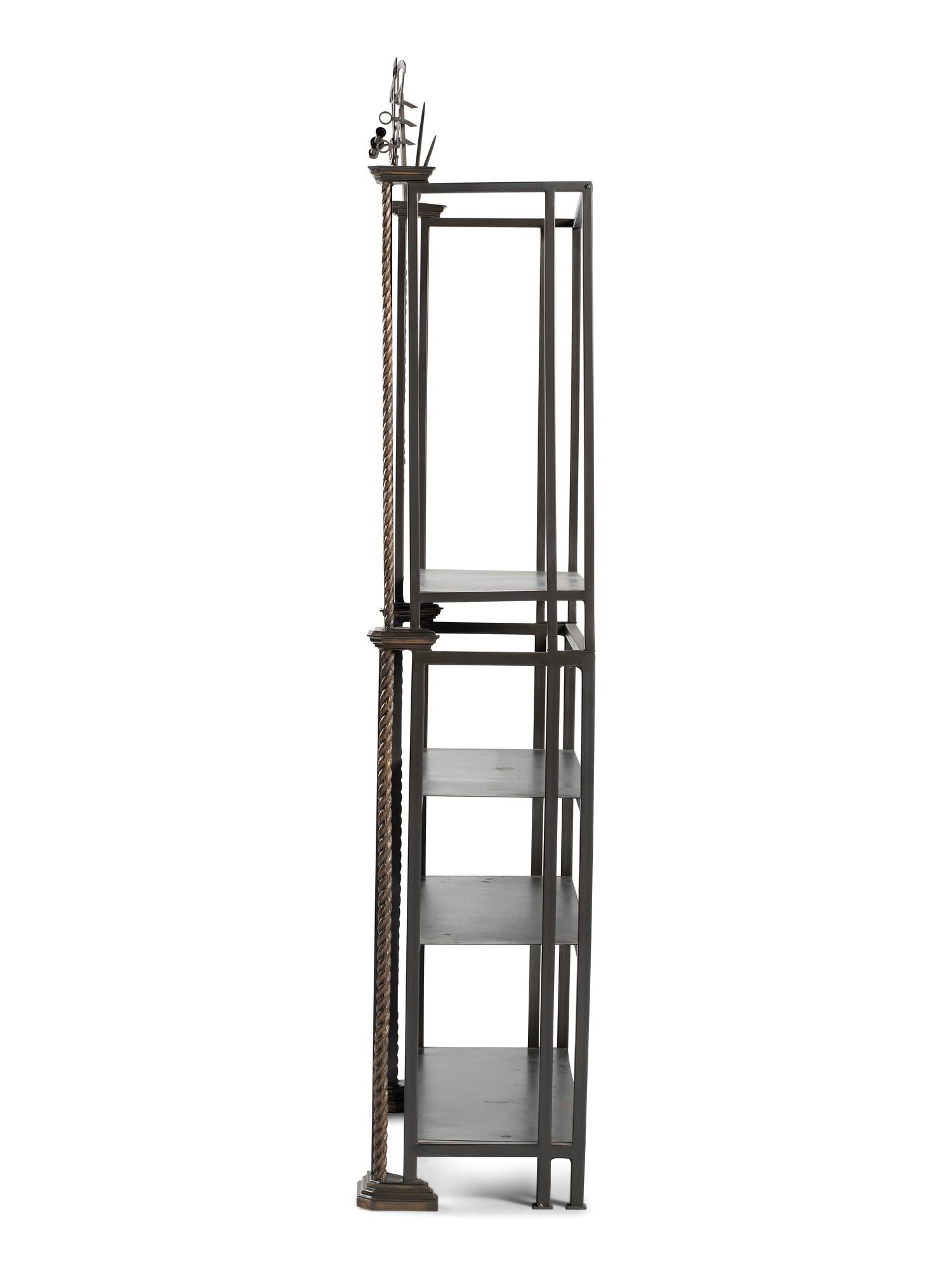 A Cast Iron and Bronze Nautical Themed Three-Tiered Bookshelf