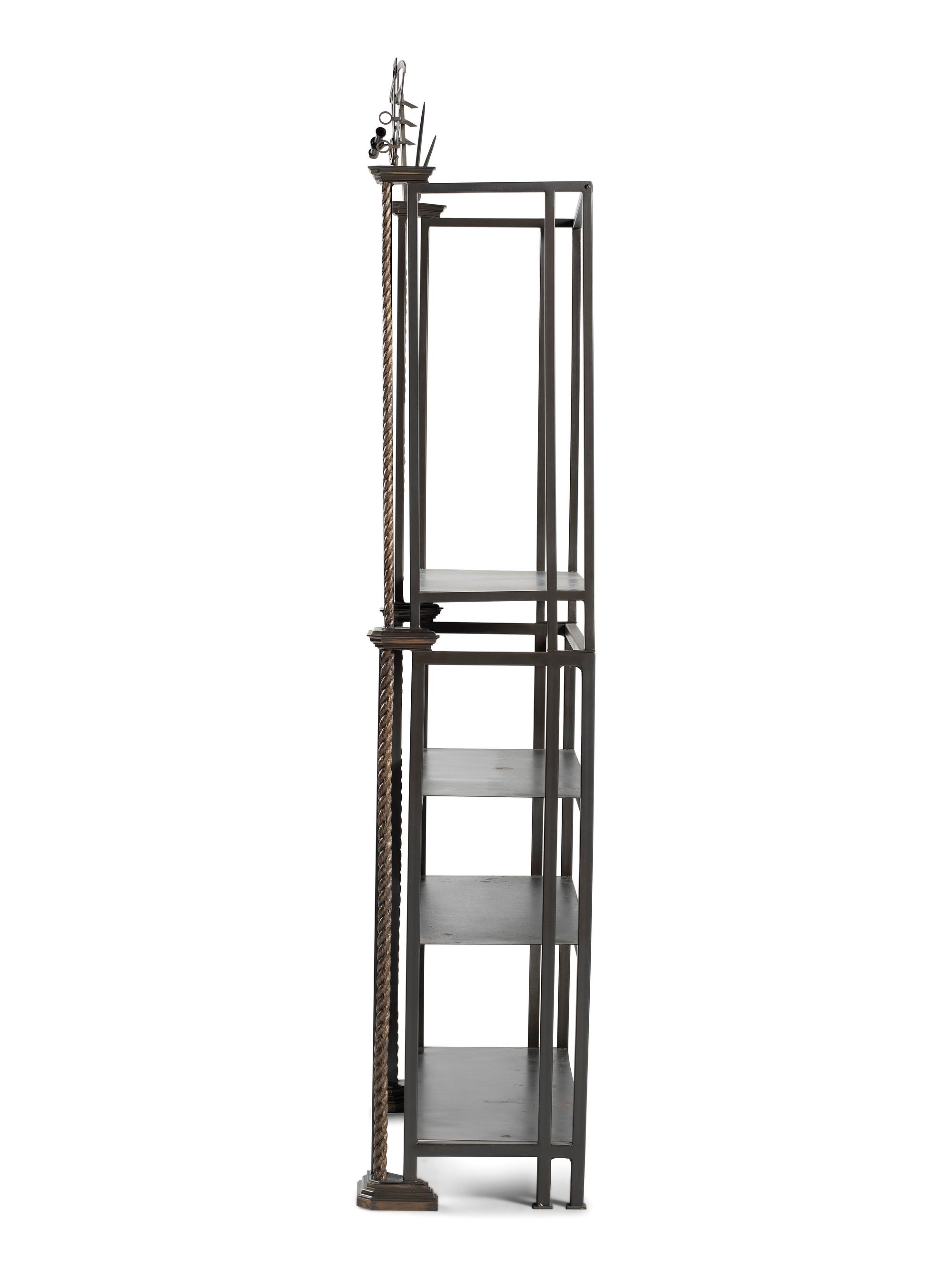 A Cast Iron and Bronze Nautical Themed Three-Tiered Bookshelf