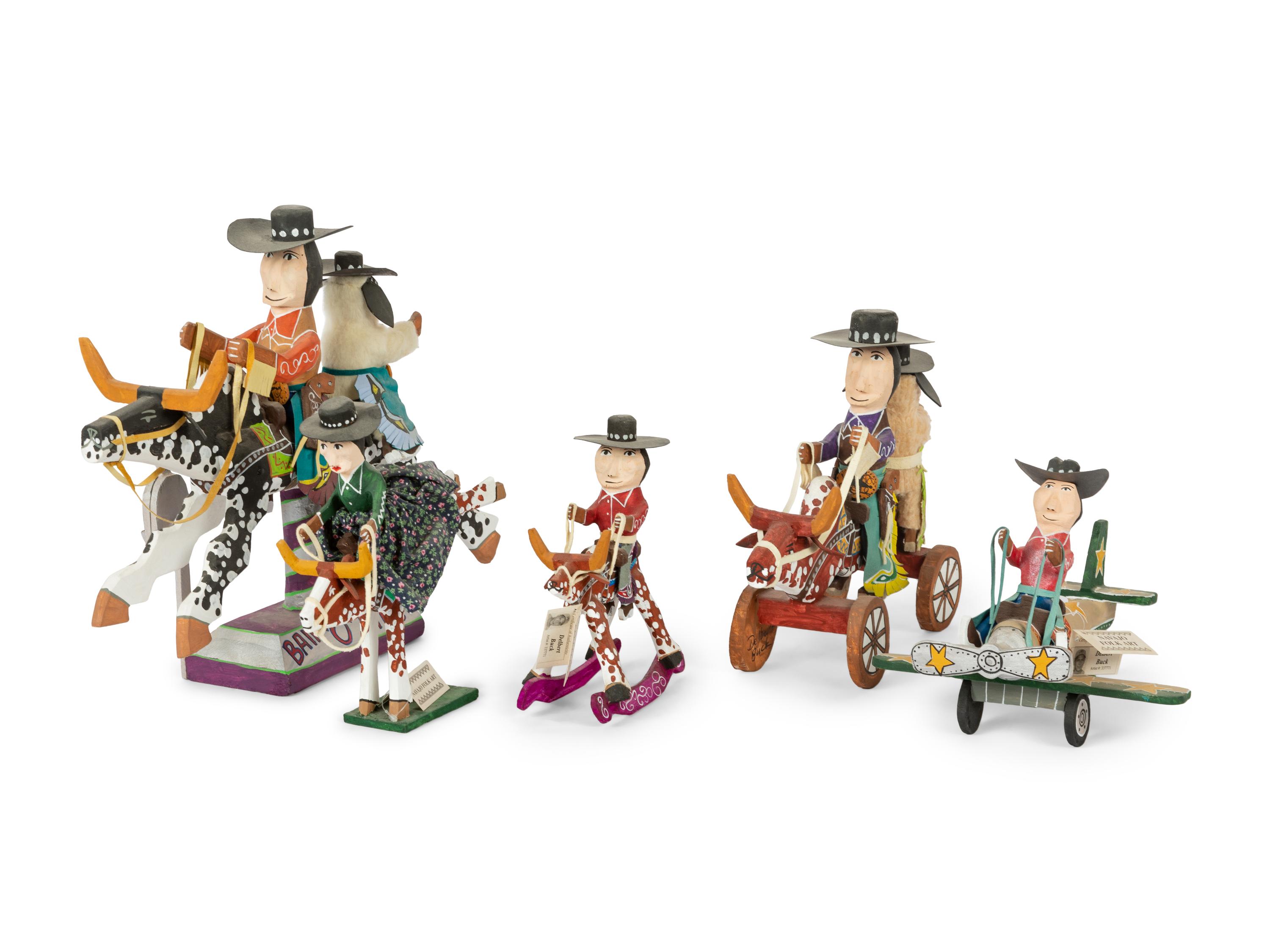 Eight Carved Wood Folk Art Sculptures