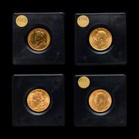 [GREAT BRITAIN AND CANADA] A Group of Four George V Gold Coins