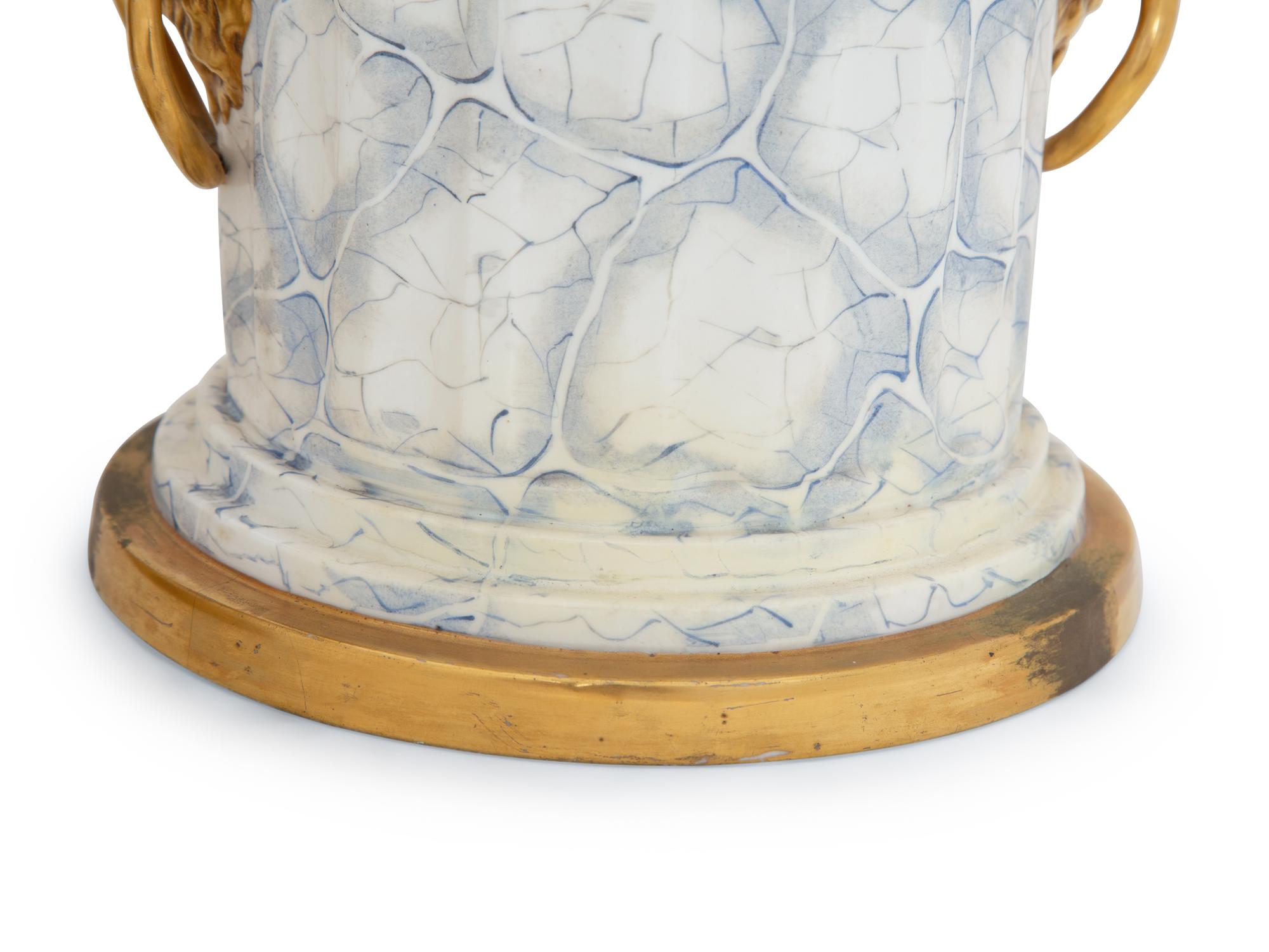 A Pair of English Parcel Gilt Porcelain Fruit Coolers