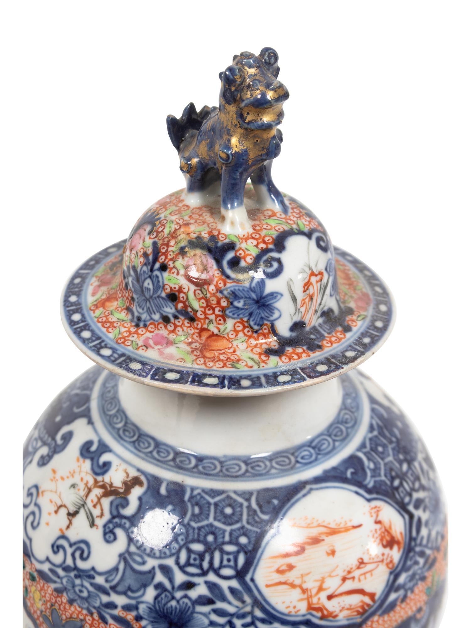 A Pair of Chinese Export Mandarin Palette Vases and Covers