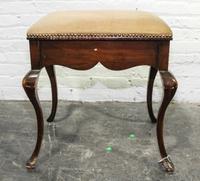 A Georgian Style Mahogany Stool. Height 23 x width 19 x depth 14 inches.